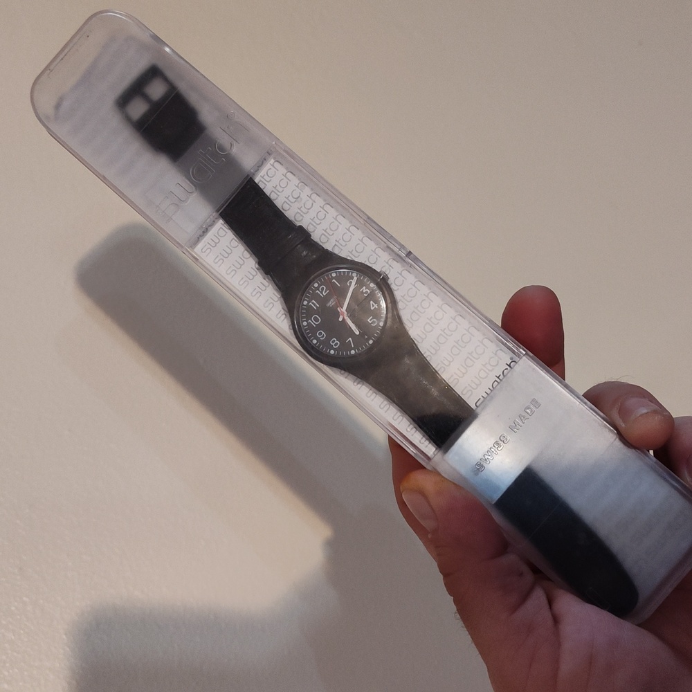 Swatch 34mm black unisex leather watch needs battery